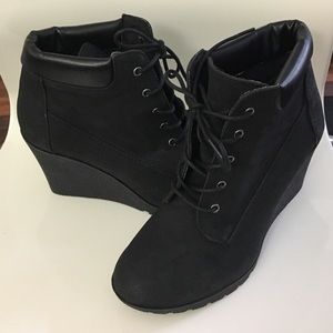 Black wedge ankle booties.